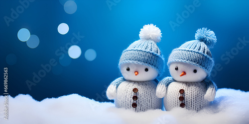 snowman on the snow ,Two snowmen standing in the snow over a wintery scene generative ai  © Hadi