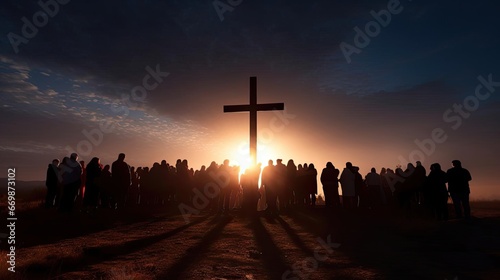 Group of people holding a large Christian cross photo