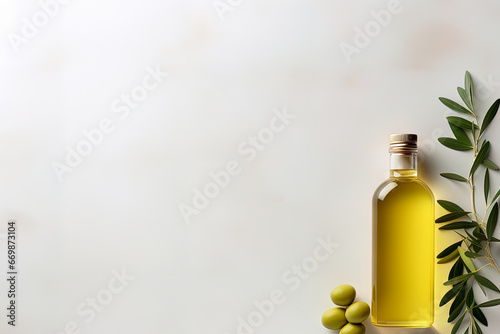 Mock up with plump green olives and bottle of premium olive oil photo