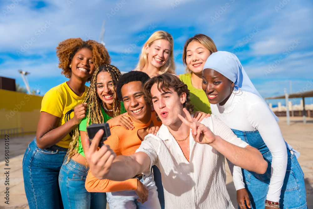 Friends gesturing success while taking a selfie Friends gesturing success while taking a selfie