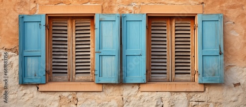 Vintage house with wooden window shutters