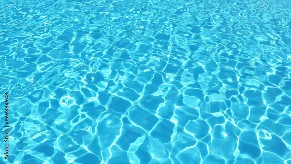 Water surface texture, Slow motion clean swimming pool ripples and wave, Refraction of sunlight top view texture sea side, sun shine water background. Water Caustic Background Water surface texture, Slow motion clean swimming pool ripples and wave, Refraction of sunlight top view texture sea side, sun shine water background. Water Caustic Background