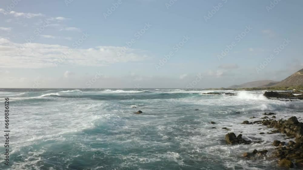 Pushing low along the ocean waves Pushing low along the ocean waves