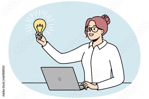 Businesswoman in glasses holds lit light bulb in front of her as symbol of inspiring idea, motivation, source of energy. Talented girl works at computer. Vector minimalistic design isolated on blue.