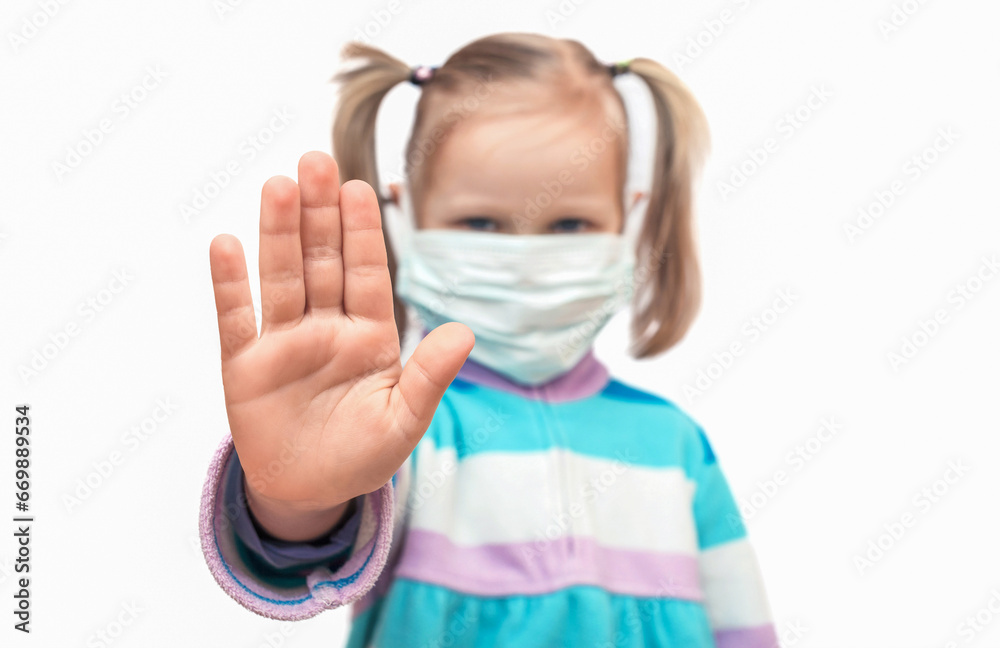 Stop Sign. Help Stop Infectious Disease of Coronavirus Pandemic in the World. Child in Mask with Hand showing gesture Stop Infection Isolated on White Backgrond. Help Sign. Children Health Care. Stop Sign. Help Stop Infectious Disease of Coronavirus Pandemic in the World. Child in Mask with Hand showing gesture Stop Infection Isolated on White Backgrond. Help Sign. Children Health Care.