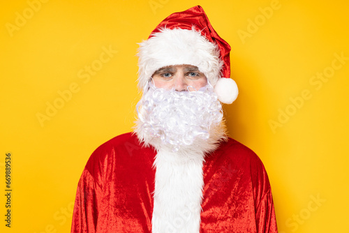 Santa Claus, portrait on a yellow background.