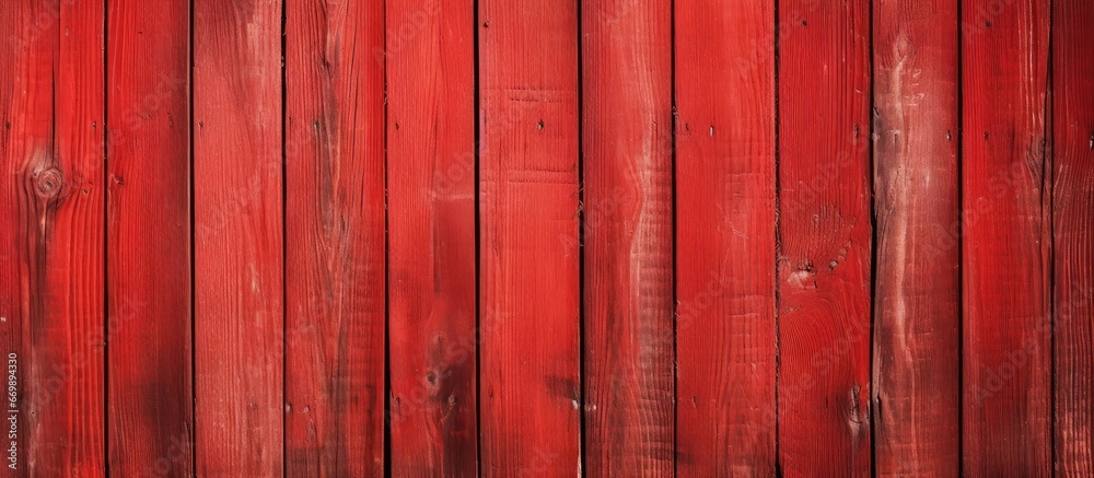 Red painted wooden fence with aged texture Red painted wooden fence with aged texture