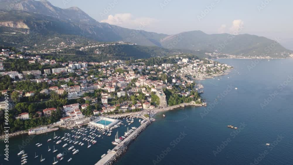 Aerial: Škver Harbor, Herceg Novi, Montenegro with boats and mountains Aerial: Škver Harbor, Herceg Novi, Montenegro with boats and mountains