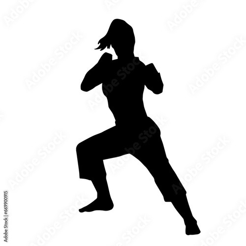 Silhouette of a female martial art person in action pose. Silhouette of a woman fighter in martial art pose.