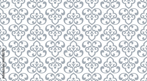 Wallpaper in the style of Baroque. Seamless vector background. White and gray floral ornament. Graphic pattern for fabric, wallpaper, packaging. Ornate Damask flower ornament.