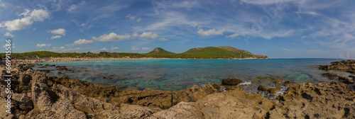 Rocky coast of Mallorca island, Spain, at Cala Agulla beach near Cala Rajada (Panorama)  photo