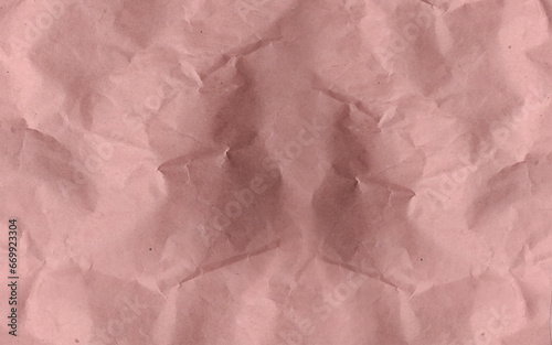 Craft crumpled paper, cardboard background. Brown kraft sheet texture, torn antique page, wallpaper or parchment abstract design
