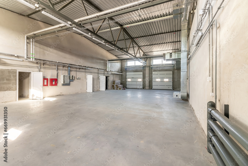 Industrial building or modern factory for manufacturing production plant or large warehouse Industrial building or modern factory for manufacturing production plant or large warehouse