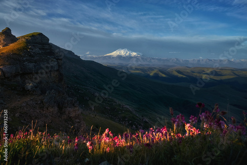 Fototapeta Naklejka Na Ścianę i Meble -  Morning landscape on peaks of Mount Elbrus. Big high mountain covered with snow, Caucasus Mountains, Russia