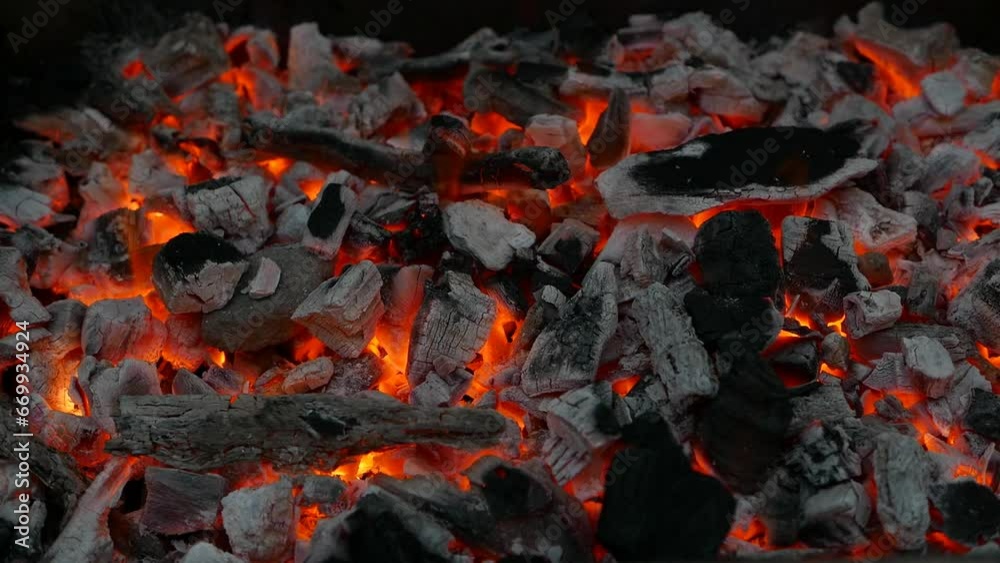 Close up of burning charcoal on a barbeque. Close up of burning charcoal on a barbeque.