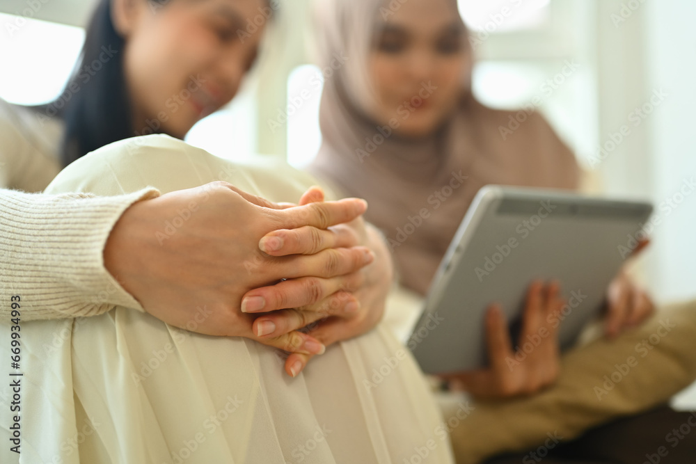 Two female best friend browsing internet or watching video on digital tablet Two female best friend browsing internet or watching video on digital tablet