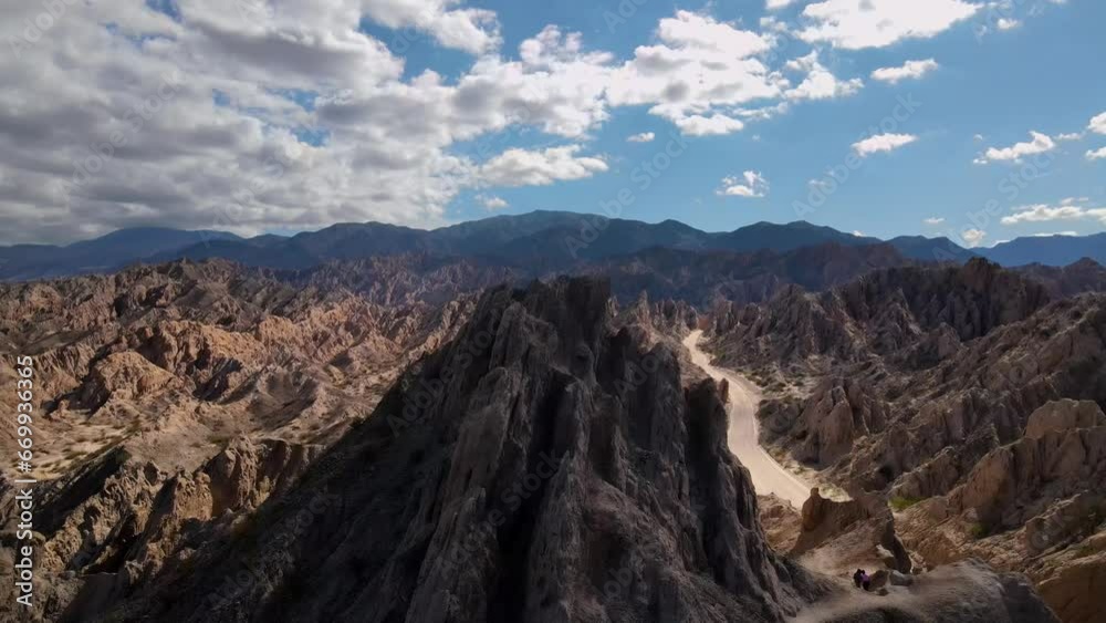 Drone shot flying over sharp rock formations to reveal the Quebrada de las Flechas in Salta, Argentina. Drone shot flying over sharp rock formations to reveal the Quebrada de las Flechas in Salta, Argentina.