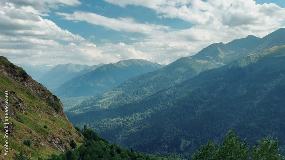 View of the mountain range near Mount Zakan. The top of the mountain node of the western part of the main ridge of the Greater Caucasus. Zakan Peak is the beginning of the Magisho mountain range. 4К View of the mountain range near Mount Zakan. The top of the mountain node of the western part of the main ridge of the Greater Caucasus. Zakan Peak is the beginning of the Magisho mountain range. 4К