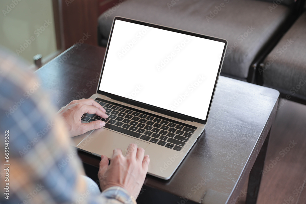 computer screen blank mockup.hand woman work using laptop with white background for advertising,contact business search information on desk at coffee shop.marketing and creative design computer screen blank mockup.hand woman work using laptop with white background for advertising,contact business search information on desk at coffee shop.marketing and creative design
