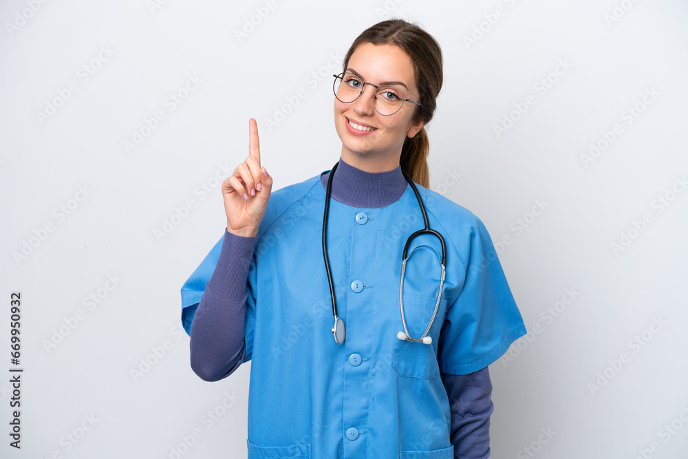 Young caucasian nurse woman isolated on white background showing and lifting a finger in sign of the best Young caucasian nurse woman isolated on white background showing and lifting a finger in sign of the best