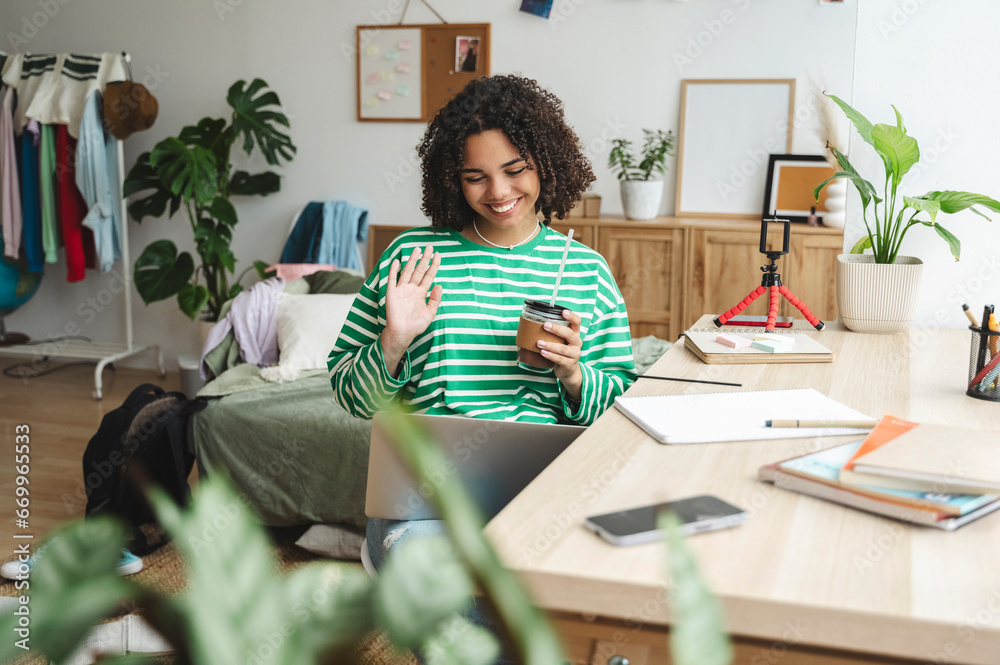 Happy girl talking on video call at home Happy girl talking on video call at home