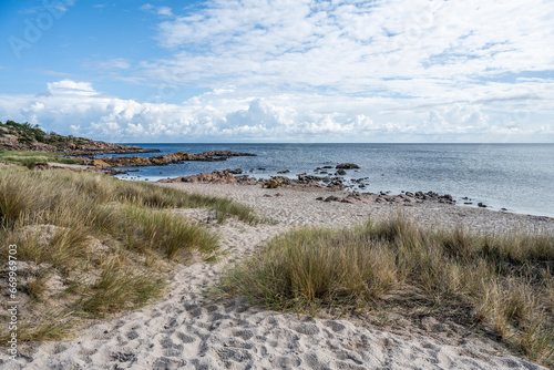 Denmark, Bornholm, Sandvig beach with Baltic Sea in background