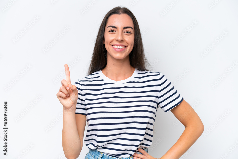 Young caucasian woman isolated on white background showing and lifting a finger in sign of the best