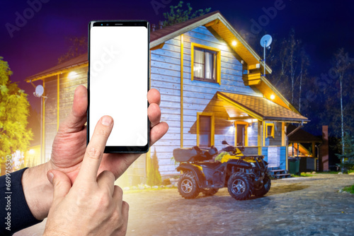 Country house. Phone in man...