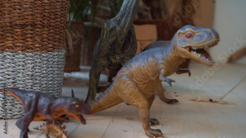 collection of plastic toy dinosaurs