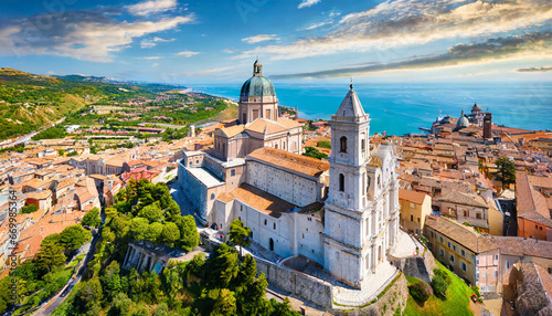 bright summer view from flying drone of cattedrale di san ciriaco church and san gregorio illuminatore catholic church stunning morning cityscape of ancona town italy europe photo