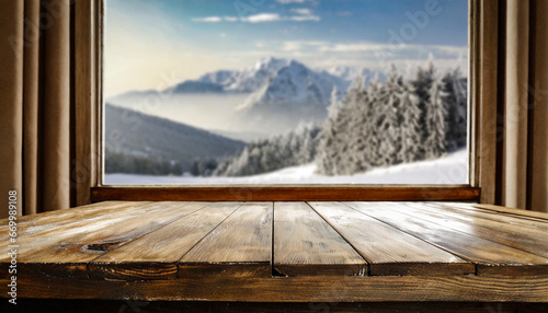 wooden table and window with blurred mountain winter trees landscape background high quality photo © Nichole
