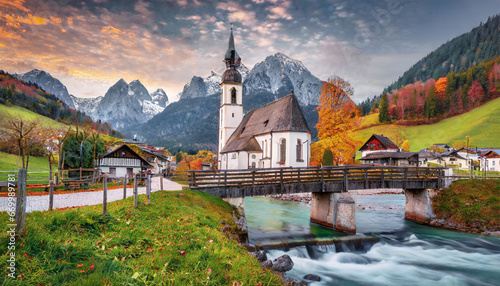 spectacular morning scene of parish church of st sebastian colorful autumn view of ramsau village bavaria germany europe beauty of countryside concept background