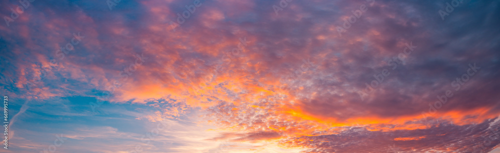 Majestic morning colorful sunlight sky clouds. Heavenly light reflected on fluffy clouds in golden hour. Bright sun beams rays over panoramic view in summer gorgeous season. Inspire peaceful skyscape