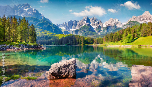 colorful summer view of fusine lake bright morning scene of julian alps with mangart peak on background province of udine italy europe traveling concept background