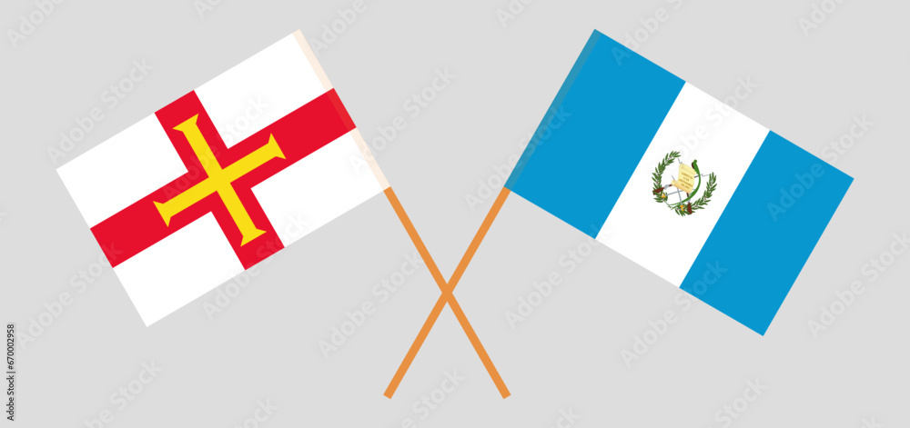 Crossed flags of Bailiwick of Guernsey and Guatemala. Official colors. Correct proportion