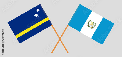 Crossed flags of Country of Curacao and Guatemala. Official colors. Correct proportion