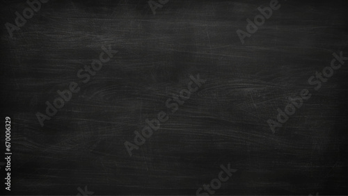 Abstract chalk rubbed out on blackboard or chalkboard texture clean school board for background. old black wall background texture Blackboard texture horizontal black board and chalkboard background.  photo