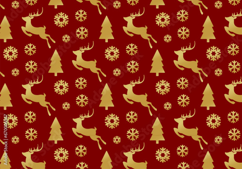 christmas vector seamless pattern with reindeer, christmas trees and snowflakes. golden metallic repeating holiday pattern on red background. new year gold pattern photo