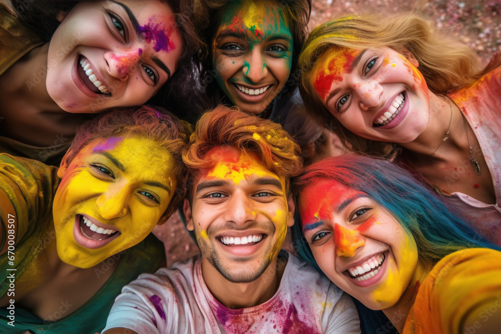 Indian young friends playing holi