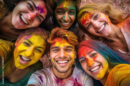 Indian young friends playing holi