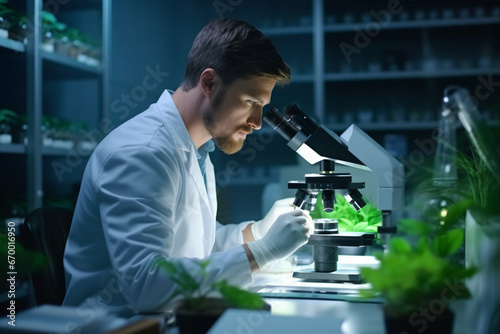 Handsome Male Microbiologist Looking at a Healthy Green Leaf Sample  Medical Scientist Working in a Modern Food Science Laboratory with Advanced Technology Microscopes and Computers