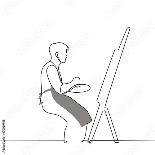 male artist in an apron sits in front of an easel with a palette in his hand - one line art vector. concept creativity