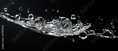 Macro photography captures the collision of water droplets