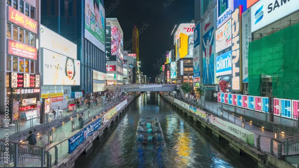 Illuminated signboards at Ebisubashi Bridge on the Dotonbori Canal. The Osaka's famous landmarks at Dotonbori area. 