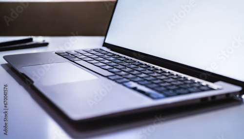 Close up of a clean business desk, laptop, work space