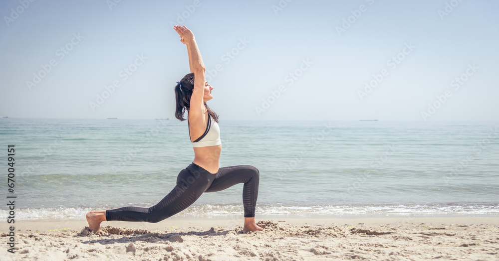 Fitness Girl working out on the beach