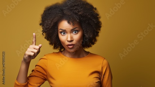 Confident African Businesswoman Pointing Outdoors