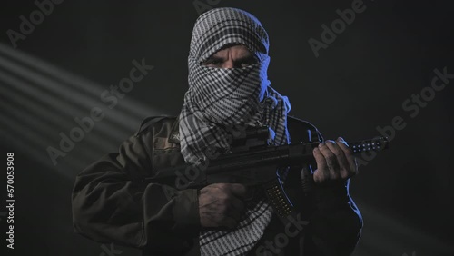 portrait of terrorist soldier holding machine gun,rebel militant separist
