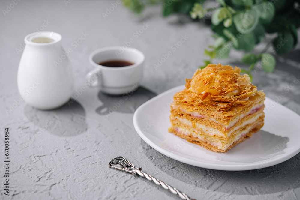 Napoleon cake slices with cup of coffee Napoleon cake slices with cup of coffee