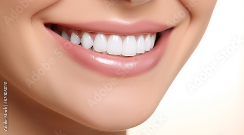 Perfect white teeth smile of a young woman  close up